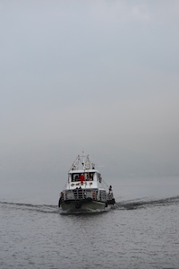 Monsoon in the highlands 大理雨季雾中游船 ferry sailing in fog